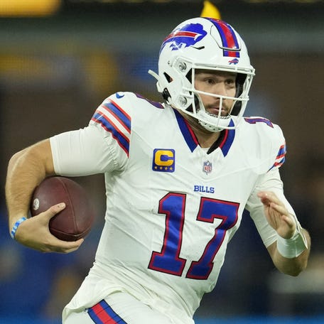 Dec 23, 2023; Inglewood, California, USA; Buffalo Bills quarterback Josh Allen (17) carries the ball against the Los Angeles Chargers in the first half at SoFi Stadium. Mandatory Credit: Kirby Lee-USA TODAY Sports