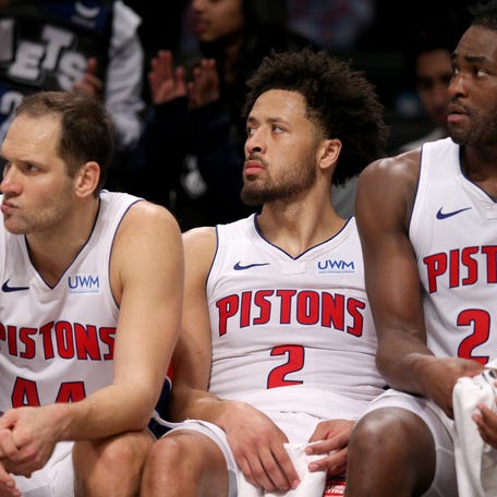 Detroit Pistons forward Bojan Bogdanovic (44) and guard Cade Cunningham (2) and center Isaiah Stewart (28) watch from the bench during the fourth quarter of a loss to the Brooklyn Nets at Barclays Center.
