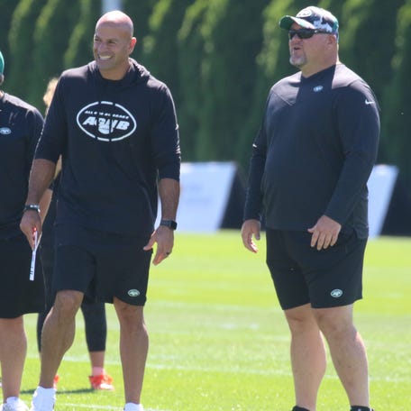 Jets coach Robert Saleh and general manager Joe Douglas look on during practice at the New York Jets Training Camp in Florham Park, N.J. on July 30, 2022.