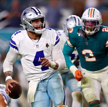 Dak Prescott #4 of the Dallas Cowboys scrambles during the fourth quarter in the game against the Miami Dolphins at Hard Rock Stadium on December 24, 2023 in Miami Gardens, Florida.