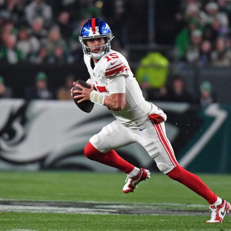 Dec 25, 2023; Philadelphia, Pennsylvania, USA; New York Giants quarterback Tommy DeVito (15) looks for a receiver against the Philadelphia Eagles during the second quarter at Lincoln Financial Field. Mandatory Credit: Eric Hartline-USA TODAY Sports
