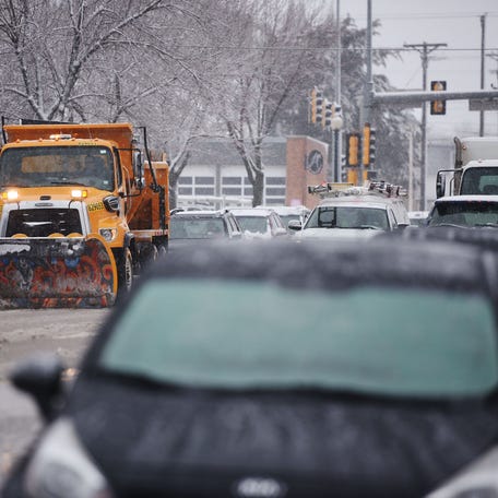 Snow plows begin to go through downtown Thursday, Dec. 27, 2018 in Sioux Falls.