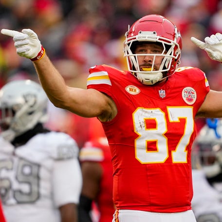 Chiefs tight end Travis Kelce (87) celebrates a first down during the first half against the Raiders at Arrowhead Stadium in Kansas City, Missouri on Dec 25, 2023.