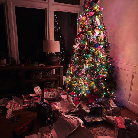 Wrapping paper strewn across the floor with presents out in plain sight was the scene waiting Scott and Katie Reintgen when their 3-year-old woke them up just after 3 a.m. Christmas morning, having done everyone the favor of unwrapping all the gifts under the tree.