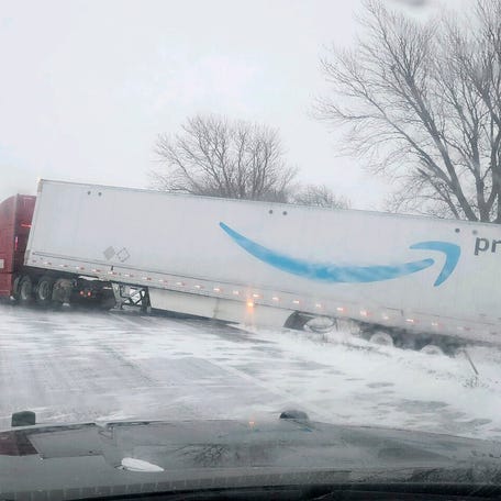 A tractor trailer veers into ditch on Christmas Day on Interstate 80 in Nebraska as a winter storm pummels part of the Midwest, on Monday, Dec. 25, 2023.