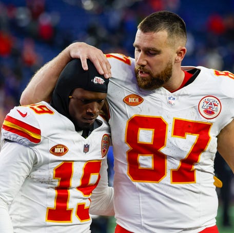 Kansas City Chiefs tight end Travis Kelce (87) celebrates with wide receiver Kadarius Toney (19) at the conclusion of an NFL football game against the New England Patriots on Sunday, Dec. 17, 2023, in Foxborough, Mass.