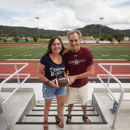 Former Dickinson State vice president Carmen Wilson and UW-La Crosse Chancellor Joe Gow posed for a rivalry photo when the football teams of their respective schools played in 2018. Gow has been fired for appearing in porn videos with Wilson.