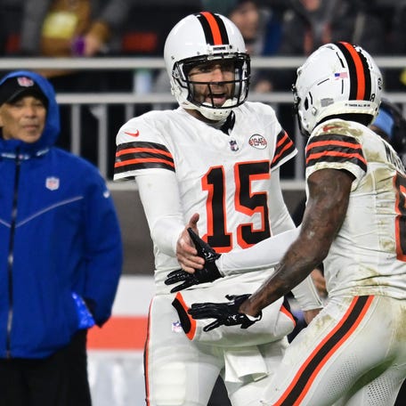 Dec 28, 2023; Cleveland, Ohio, USA; Cleveland Browns quarterback Joe Flacco (15) and wide receiver Elijah Moore (8) celebrate after a touchdown against the New York Jets during the first half at Cleveland Browns Stadium. Mandatory Credit: Ken Blaze-USA TODAY Sports
