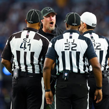 Detroit Lions head coach Dan Campbell argues with officials during the fourth quarter against the Dallas Cowboys at AT&T Stadium.