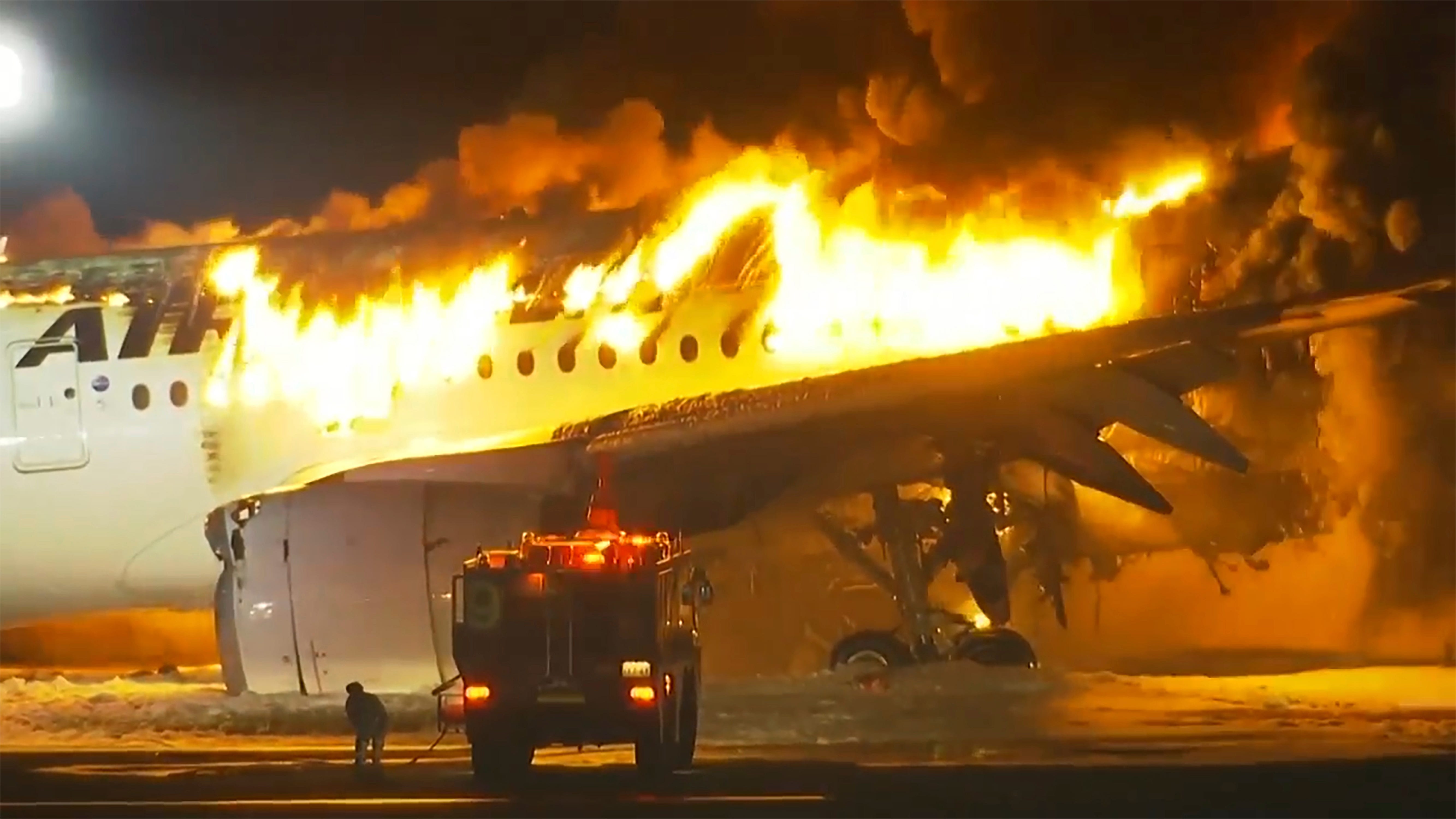 In this image made from video, a Japan Airlines plane is on fire on the runway of Haneda airport on Tuesday, Jan. 2, 2024 in Tokyo, Japan. (NTV via AP) ORG XMIT: TOK851