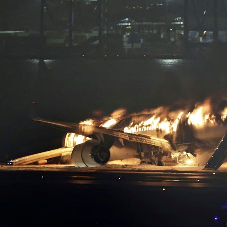 A Japan Airlines plane is on fire on the runway of Haneda airport on Tuesday, Jan. 2, 2024 in Tokyo, Japan.