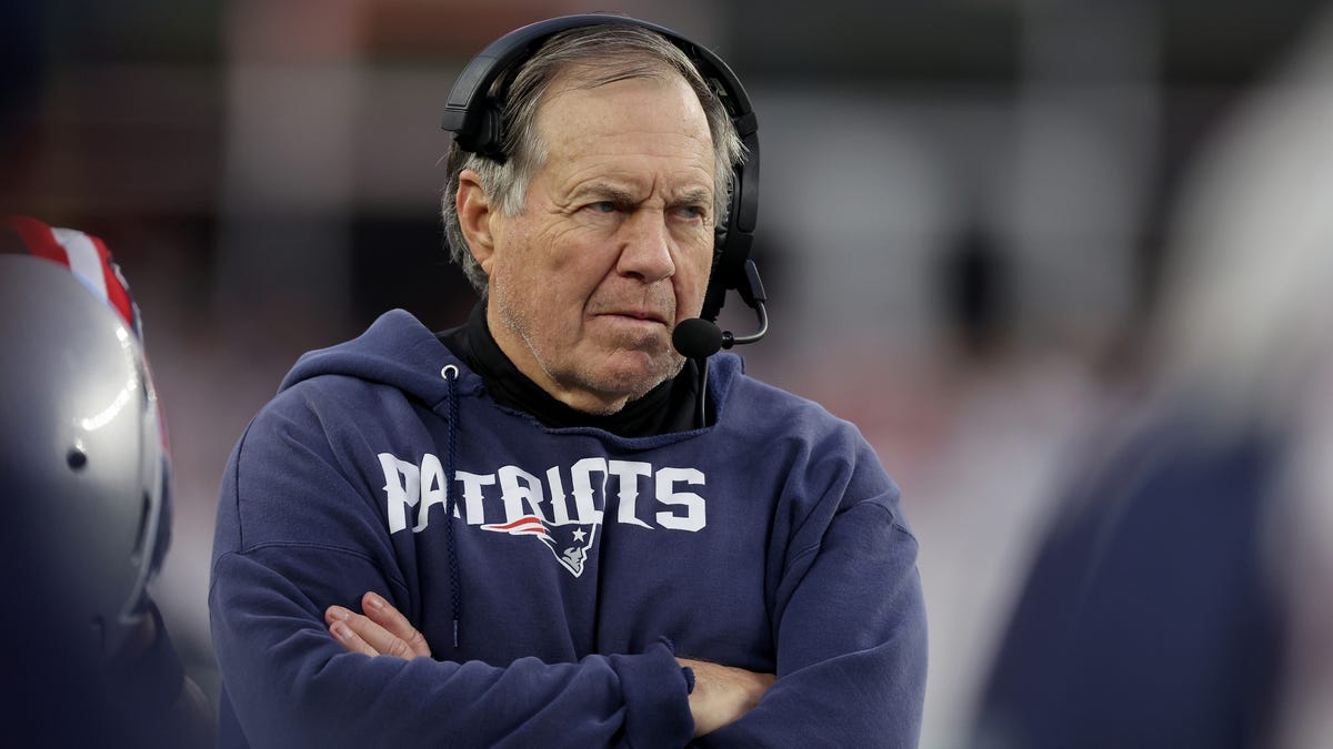 Head coach Bill Belichick of the New England Patriots looks on during the second half against the Kansas City Chiefs at Gillette Stadium on December 17, 2023 in Foxborough, Massachusetts.