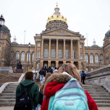 Students from East High walk out of class to the State Capitol to call for gun legislation in the wake of last week's shooting at Perry High School Monday, Jan. 8, 2024, in Des Moines.