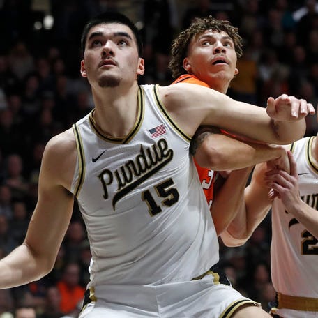 Purdue center Zach Edey (15) boxes out Illinois forward Coleman Hawkins during their game, Friday, Jan. 5, 2024, at Mackey Arena in West Lafayette, Ind.
