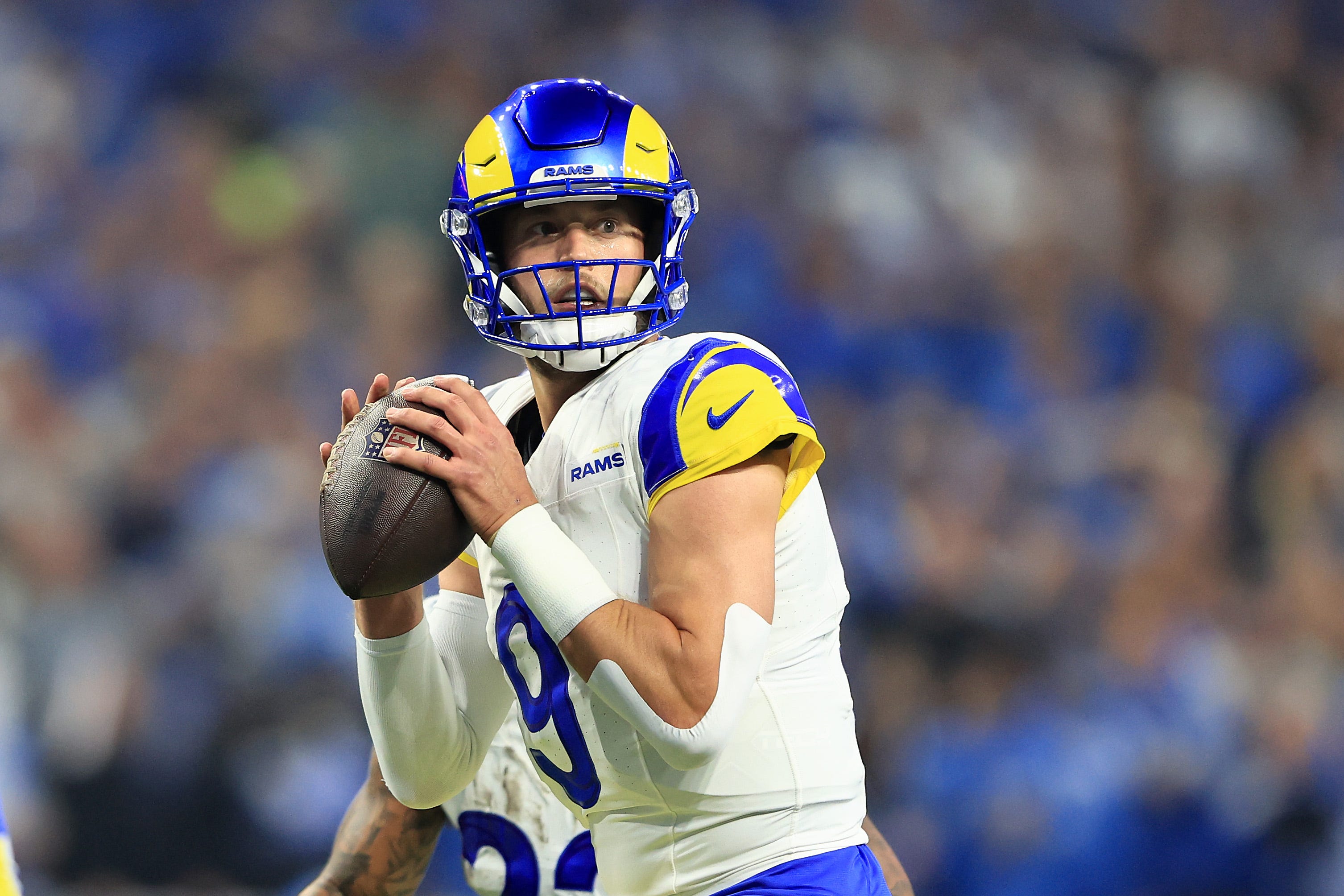Matthew Stafford #9 of the Los Angeles Rams looks to throw the ball during the first quarter against the Detroit Lions in the NFC Wild Card Playoffs at Ford Field on January 14, 2024 in Detroit, Michigan.