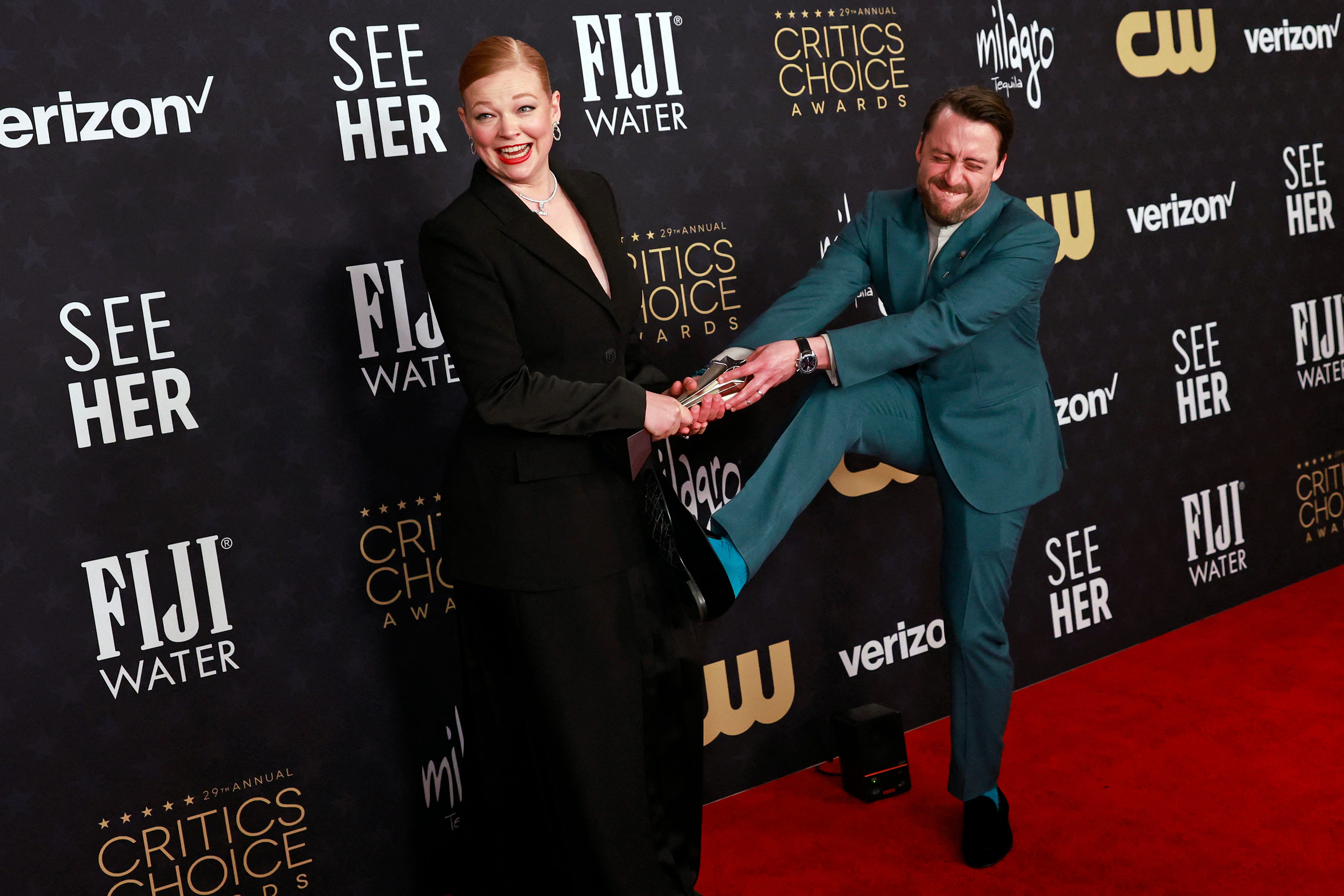 TOPSHOT - Australian actress Sarah Snook (L), winner of the Best Actress in a Drama Series award for "Succession," and US actor Kieran Culkin, winner of the Best Actor in a Drama Series award for "Succession," pose in the press room during the 29th Annual Critics Choice Awards at the Barker Hangar in Santa Monica, California on January 14, 2024. (Photo by Michael TRAN / AFP) (Photo by MICHAEL TRAN/AFP via Getty Images) ORG XMIT: 776070368 ORIG   FILE ID: 1925915213