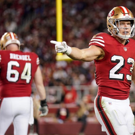 San Francisco 49ers running back Christian McCaffrey (23) reacts after a play against the Baltimore Ravens in the third quarter at Levi's Stadium.