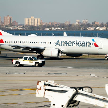 An American Airlines plane is photographed Nov. 22, 2022 at LaGuardia Airport in New York. A former American Airlines flight attendant was arrested Thursday for attempting to record a minor female passenger using an airplane bathroom while he was working in September 2023.