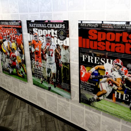 Sports Illustrated covers decorate the walls inside the new press box at Bryant Denny Stadium at University of Alabama.