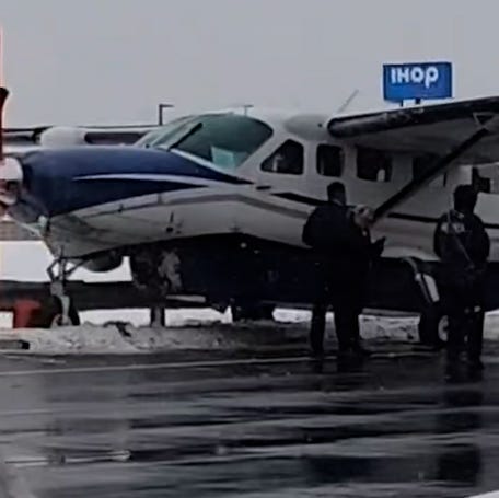 A small passenger plane that took off from Washington Dulles International Airport Friday afternoon made an emergency landing minutes later on a northern Virginia highway.