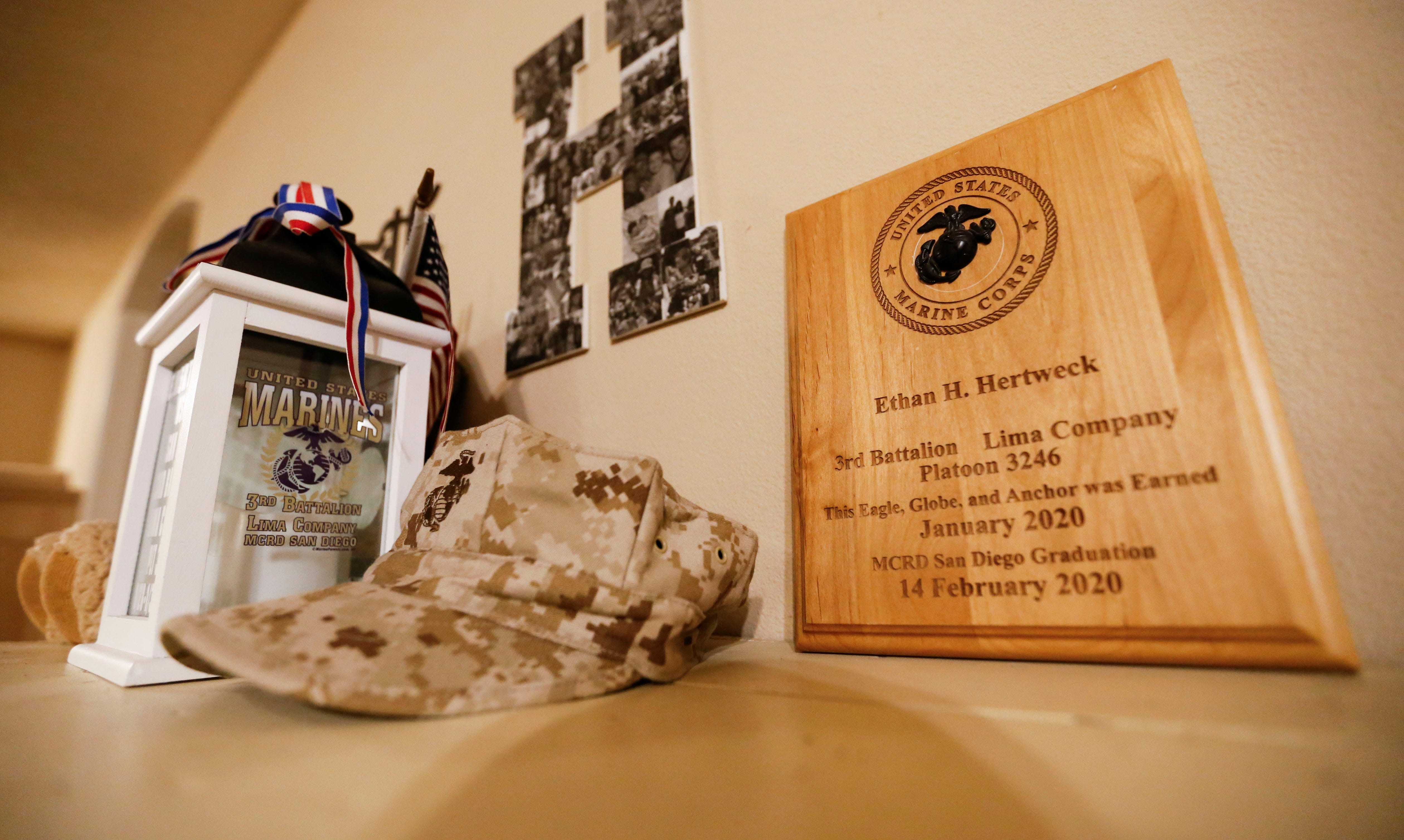 Items from Ethan Hertweck's time in the U.S. Marine Corps on display at his parents home in Springfield on Thursday, Jan. 18, 2024. Ethan was killed by Russian forces in December while fighting for Ukraine in the embattled Donetsk region.