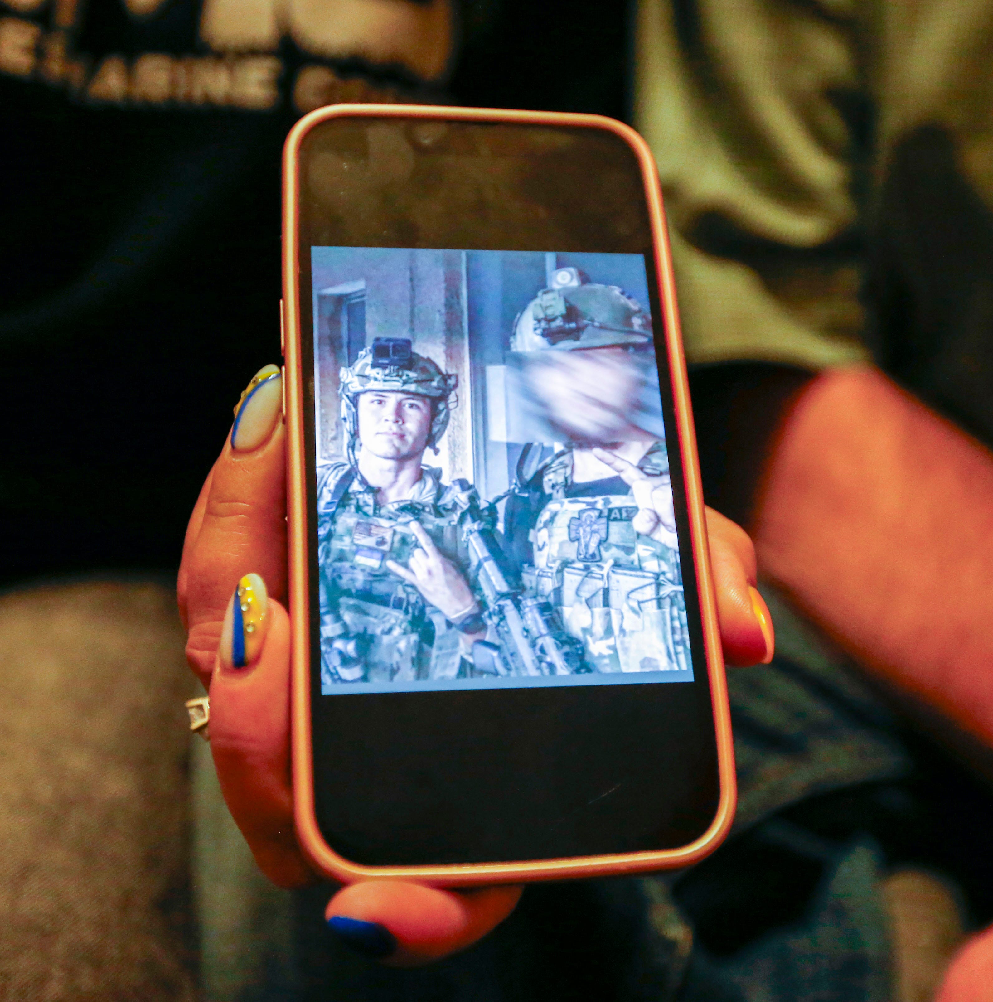 A photo of Ethan Hertweck on his mom Leslie Hertweck's phone as she talks about her son in Springfield on Thursday, Jan. 18, 2024. Ethan was killed by Russian forces in December while fighting for Ukraine in the embattled Donetsk region.
