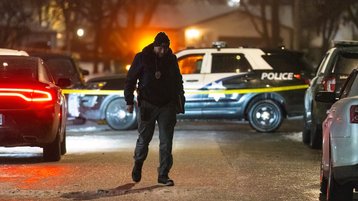 Police work a scene, Monday, Jan. 22, 2024, in Joliet, Ill., after multiple people were shot and killed over two days at three locations in the Chicago suburbs. (Tyler Pasciak LaRiviere/Chicago Sun-Times via AP) ORG XMIT: ILCHS171