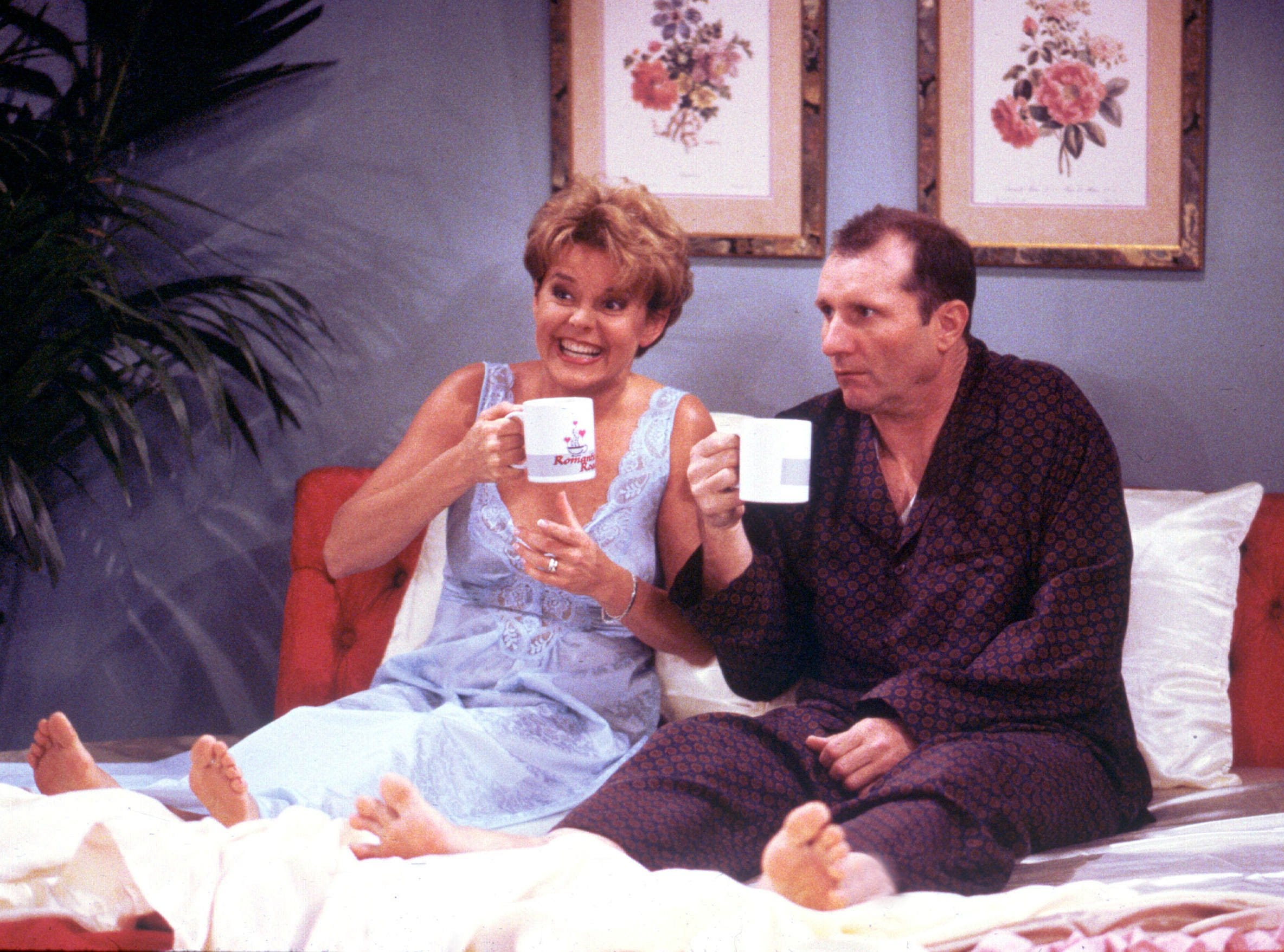 MARRIED ...WITH CHILDREN: Fill it to the rim with... Al? Arch-nemesis Al Bundy (Ed O'Neill, R) and Marcy (Amanda Bearse, L) come to a special understanding in the episode "Kiss of the Coffee Woman" Sunday, May 5 (9:00-9:30 PM ET/PT) on FOX. FOX BROADCASTING COMPANY CR: DOUG HYUN ORG XMIT: FOX5