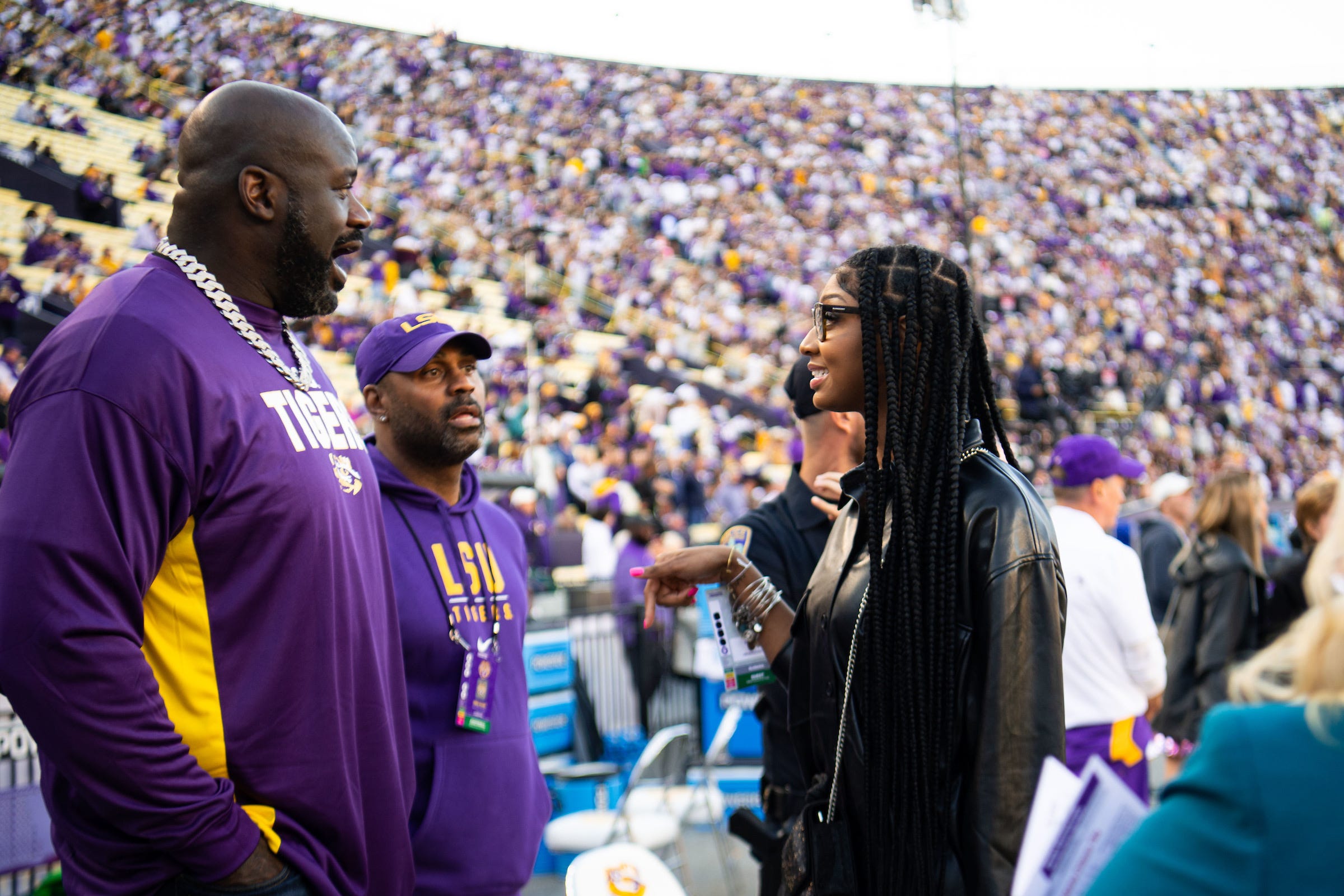 Angel Reese (right) first met LSU legend Shaquille O'Neal when they were both on the sideline of a Tigers football game.