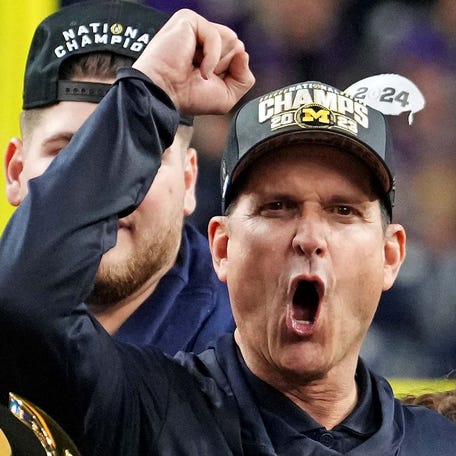 Jim Harbaugh led the Wolverines to their first national championship since they shared a title in 1997.