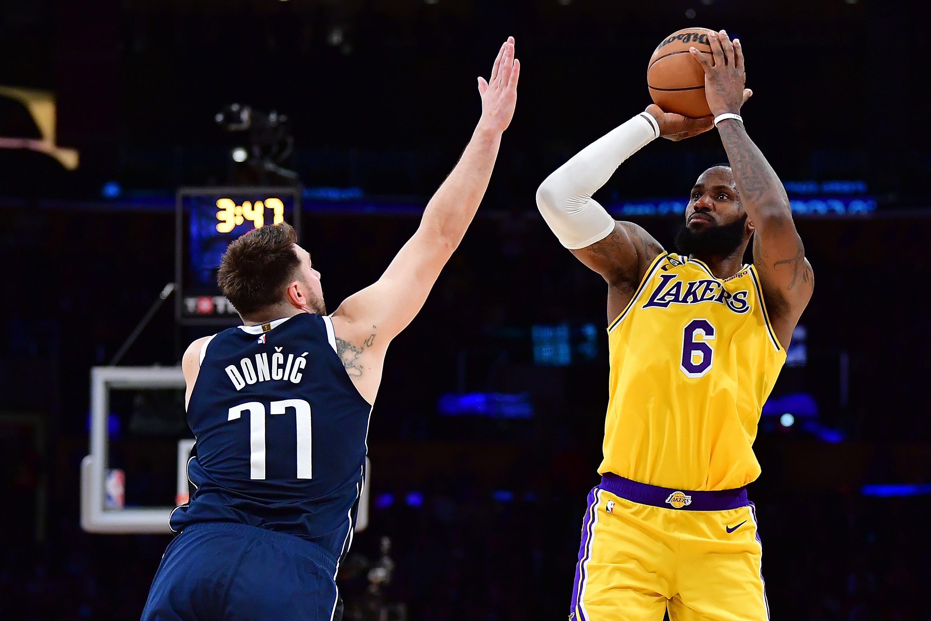 Los Angeles Lakers forward LeBron James, right, was named an NBA All-Star for the 20th consecutive time, while Dallas Mavericks guard Luka Doncic, left, earned his fifth All-Star nod.