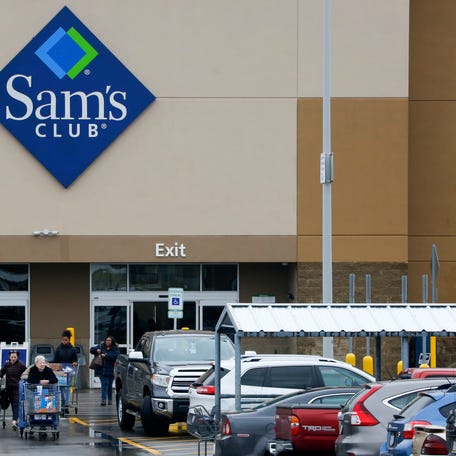 File- This Feb. 23, 2018, file photo shows shoppers leaving a Sam's Club in Pittsburgh. Walmart's Sam's Club is teaming up with several health care companies to offer discounts on everyday care its customers might delay or skip because of the cost. Starting early October, Sam's Club members in Michigan, Pennsylvania and North Carolina, will be able to buy one of four bundles of health care services ranging in annual fees from $50 for individuals to $240   for a family of up to six members. The pilot program could potentially be rolled out to members in all the states, says Lori Flees, senior vice president of Sam's Club Health and Wellness. (AP Photo/Gene J. Puskar, File) ORG XMIT: NYSH702