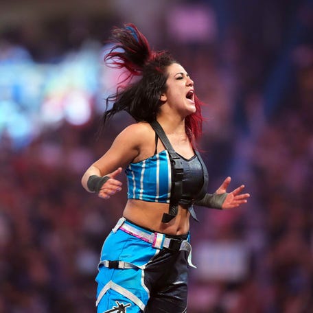Bayley celebrates after winning the women's Royal Rumble match during the Royal Rumble at Tropicana Field.