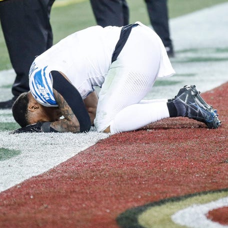 Detroit running back David Montgomery falls to the turf after the Lions' 34-31 loss to the 49ers in the NFC championship game.