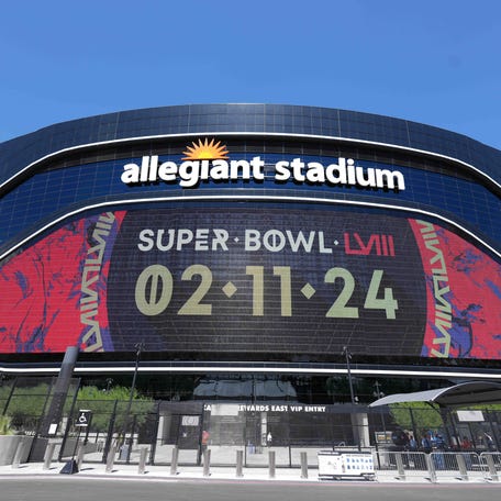 The Super Bowl LVIII (Super Bowl 58 logo) on the Allegiant Stadium marquee.