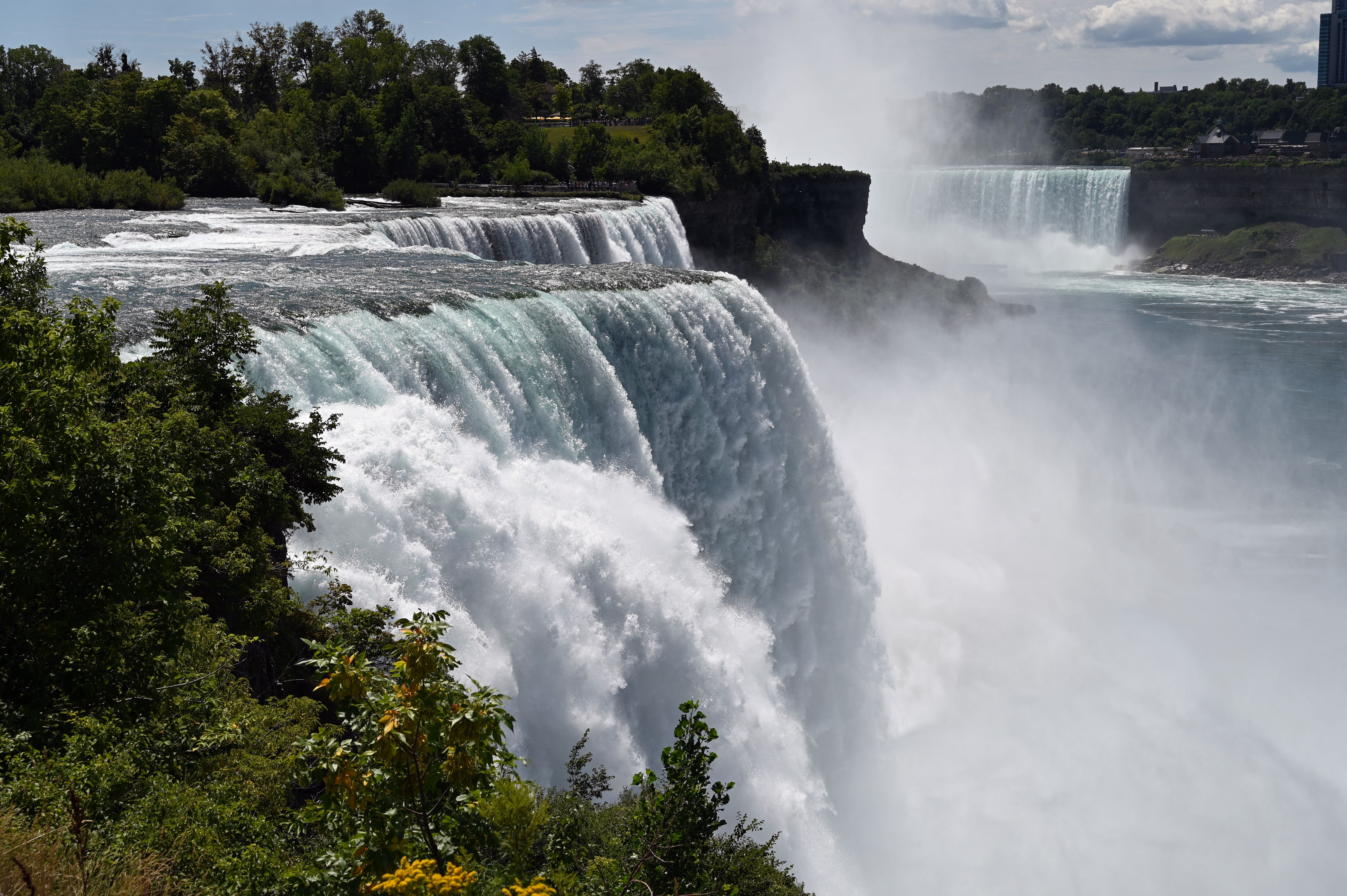 A general view shows water flowing over Niagara Falls in Niagara Falls, New York, on August 13, 2022.