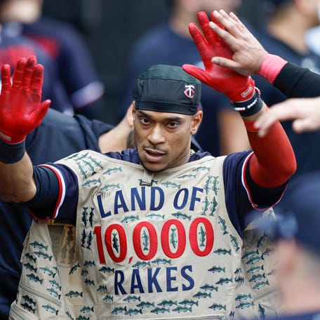 Jorge Polanco celebrates with teammates in the dugout after hitting a home run against the Chicago White Sox at Guaranteed Rate Field on Sept. 17, 2023.