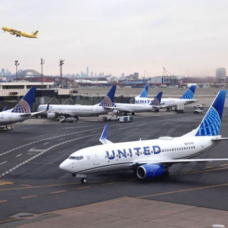 United Airlines plane are seen at Newark International Airport in this file photo from January 11 2023.