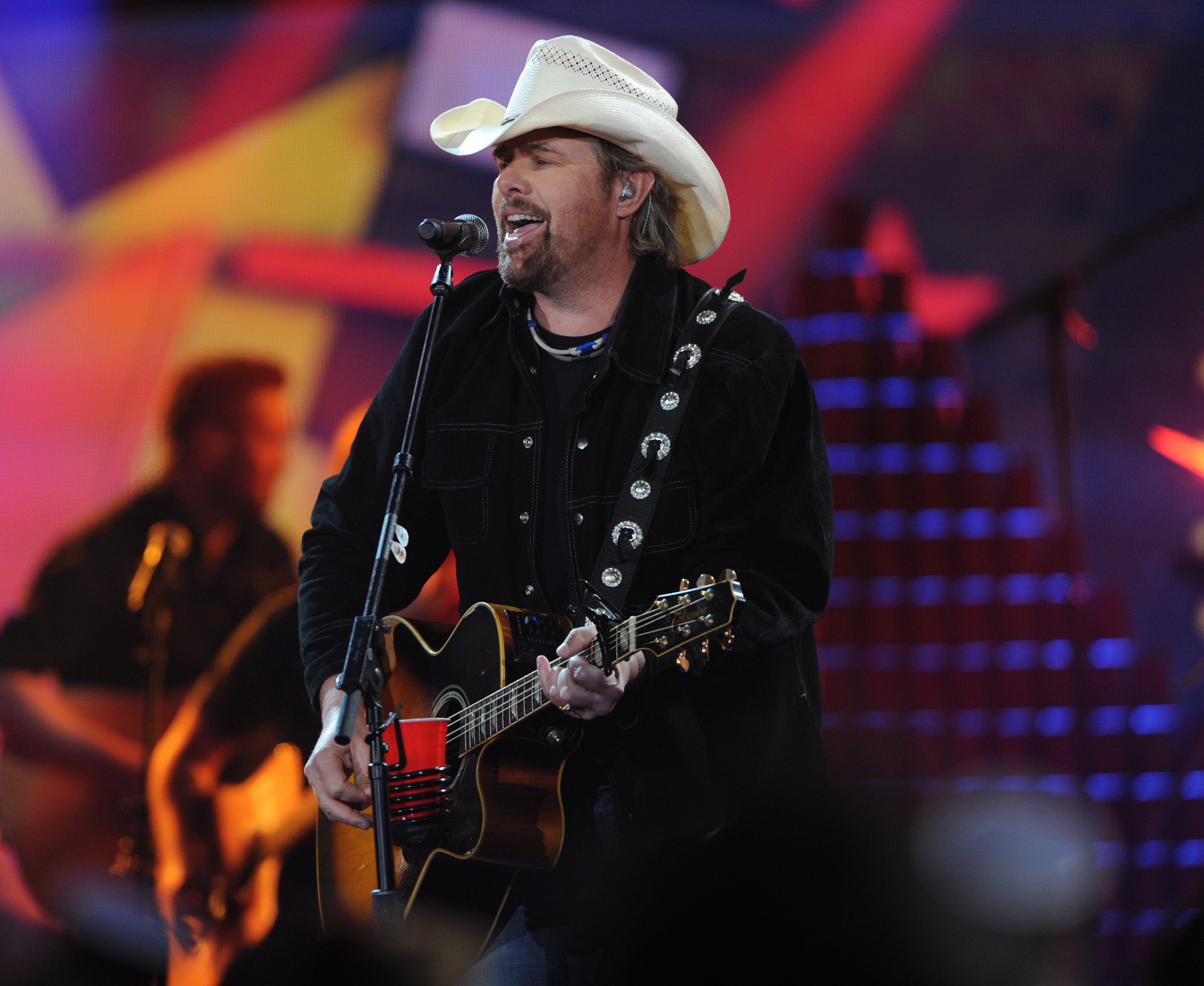 Toby Keith performs onstage.