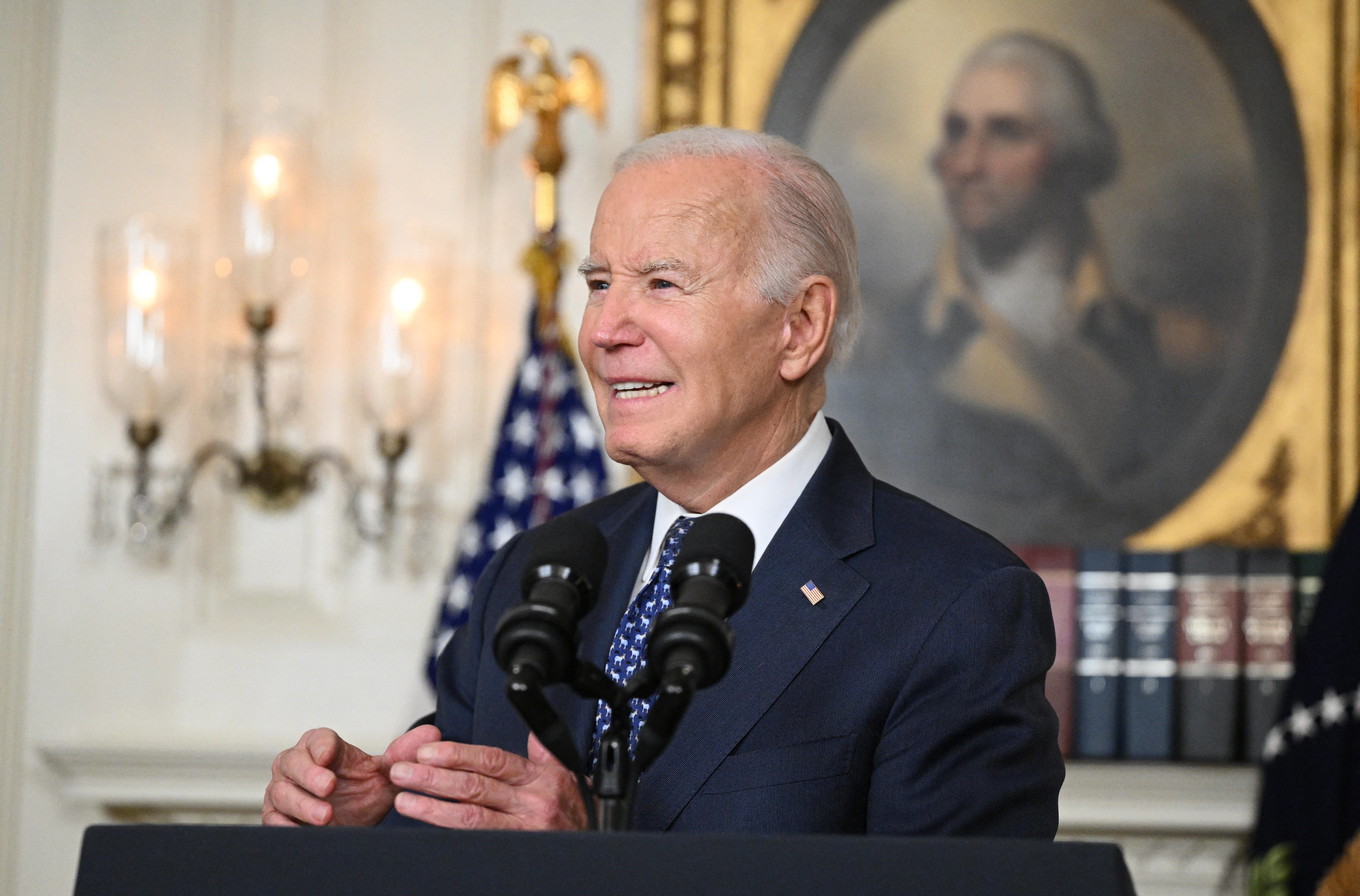 US President Joe Biden speaks about the Special Counsel report in the Diplomatic Reception Room of the White House in Washington, DC, on February 8, 2024 in a surprise last-minute addition to his schedule for the day. A long-awaited report cleared President Joe Biden of any wrongdoing in his mishandling of classified documents February 8, but dropped a political bombshell by painting the Democrat as a "well-meaning, elderly man with a poor memory."    The report removed a legal cloud hanging over Biden as he seeks reelection in a contest expected to be against Donald Trump -- who is facing a criminal trial for removing large amounts of secret documents after he lost the White House, then refusing to cooperate with investigators. (Photo by Mandel NGAN / AFP) (Photo by MANDEL NGAN/AFP via Getty Images) ORG XMIT: 776104215 ORIG FILE ID: 1988741212