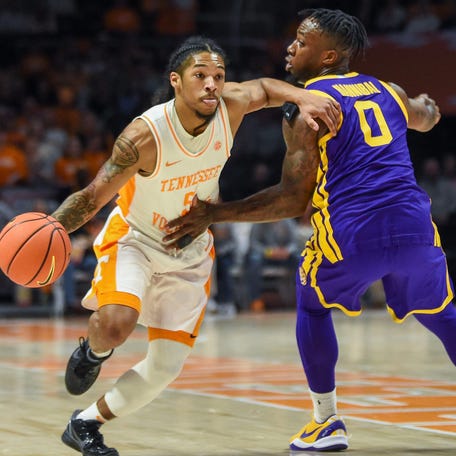 Tennessee guard Zakai Zeigler (5) drives towards the basket while guarded by LSU's Trae Hannibal (0) during their game on Wednesday, February 7, 2024 in Knoxville, Tenn.