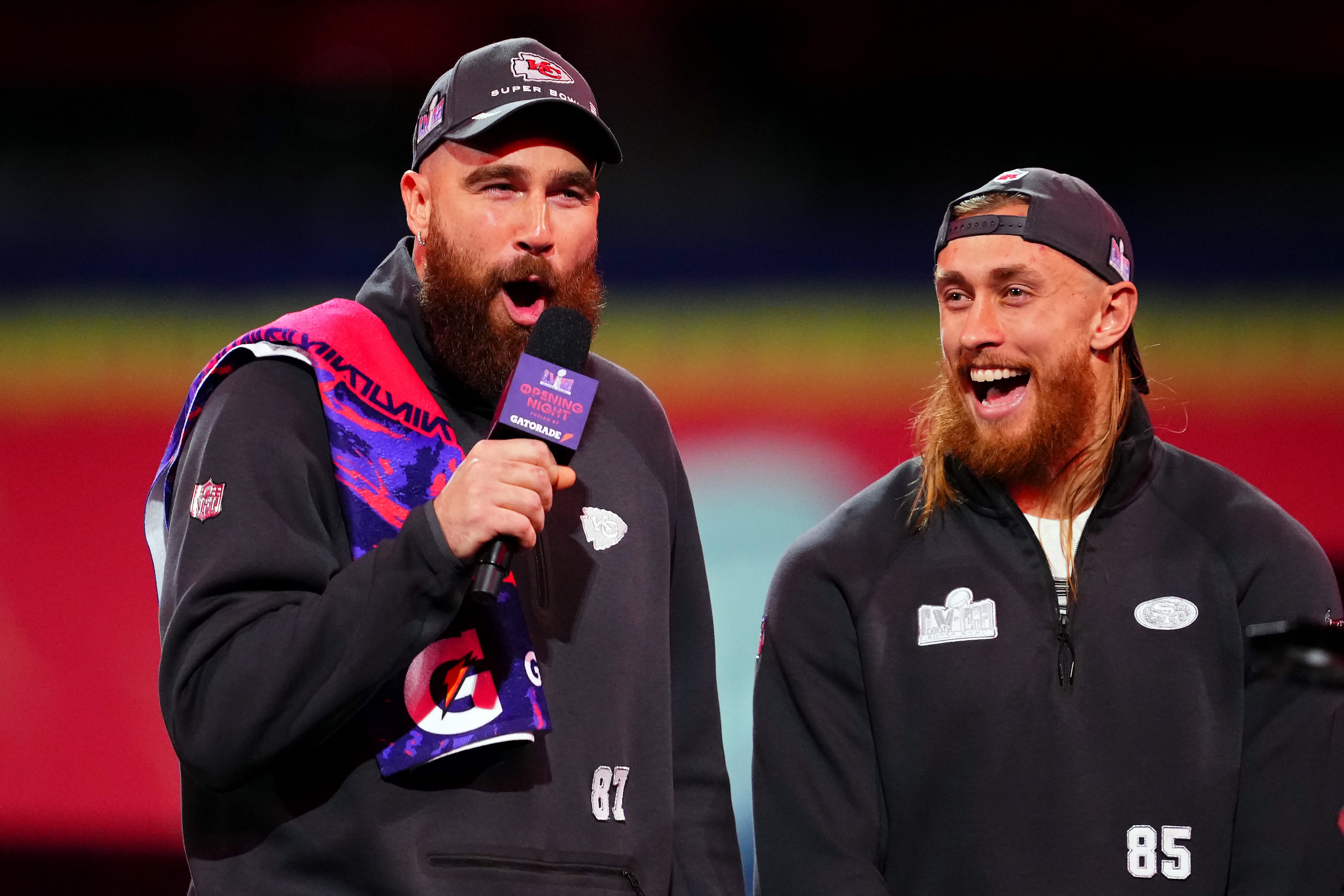 LAS VEGAS, NEVADA - FEBRUARY 05: Travis Kelce of the Kansas City Chiefs (L) and George Kittle of the San Francisco 49ers stand on stage during Super Bowl LVIII Opening Night at Allegiant Stadium on February 05, 2024 in Las Vegas, Nevada. (Photo by Chris Unger/Getty Images) ORG XMIT: 776092405 ORIG FILE ID: 1989077989