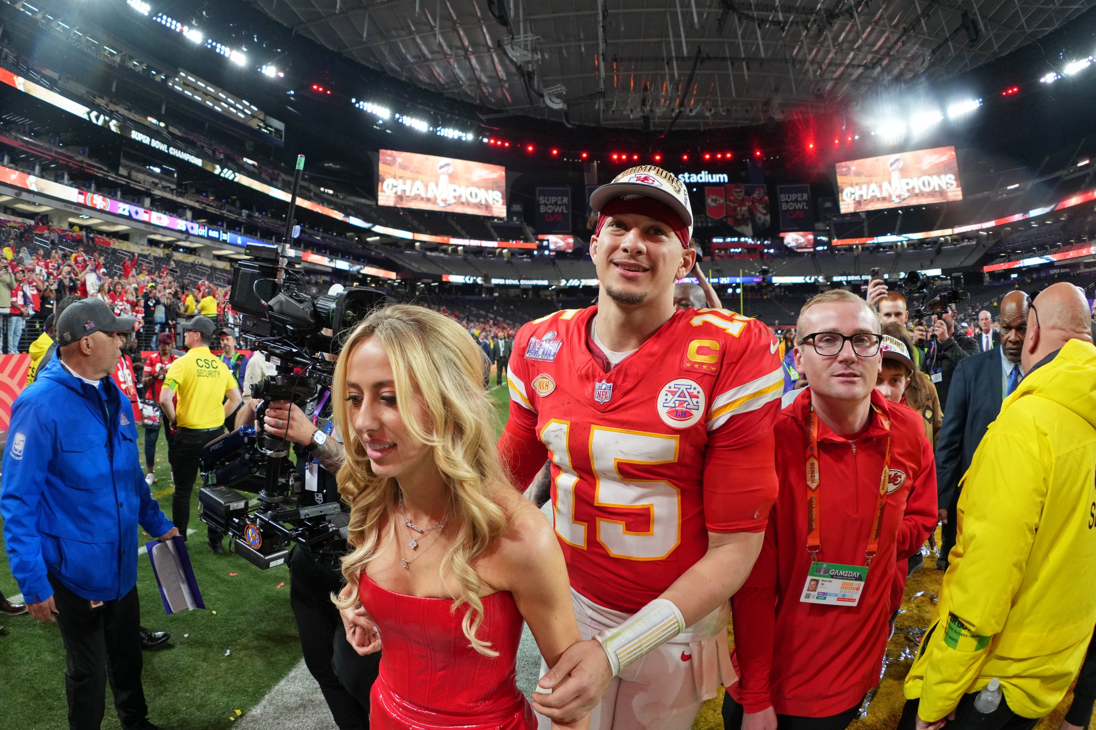 Chiefs quarterback Patrick Mahomes and his wife Brittany leave the field at Allegiant Stadium and look forward to the many celebrations yet to come.