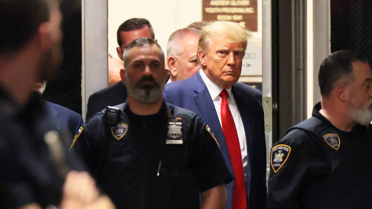 Former President Donald Trump arrives for an arraignment hearing at New York state Supreme Court on April 4, 2023 in New York City. Trump was arraigned during his first court appearance following an indictment by a grand jury that heard evidence on hush money paid to an adult film star before the 2016 election. He became the first former U.S. president to face criminal charges.