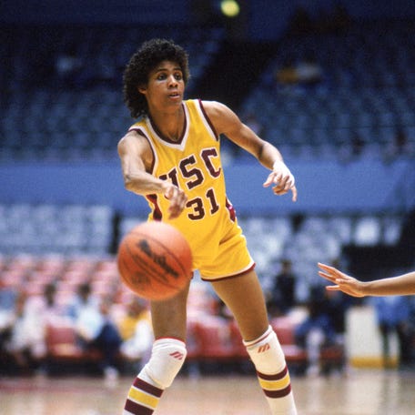 Cheryl Miller, #31 of USC Trojans, passes the ball during a women's basketball game against the Stanford Cardinal in Palo Alto, California. Cheryl Miller's college career lasted from 1983 to 1986.