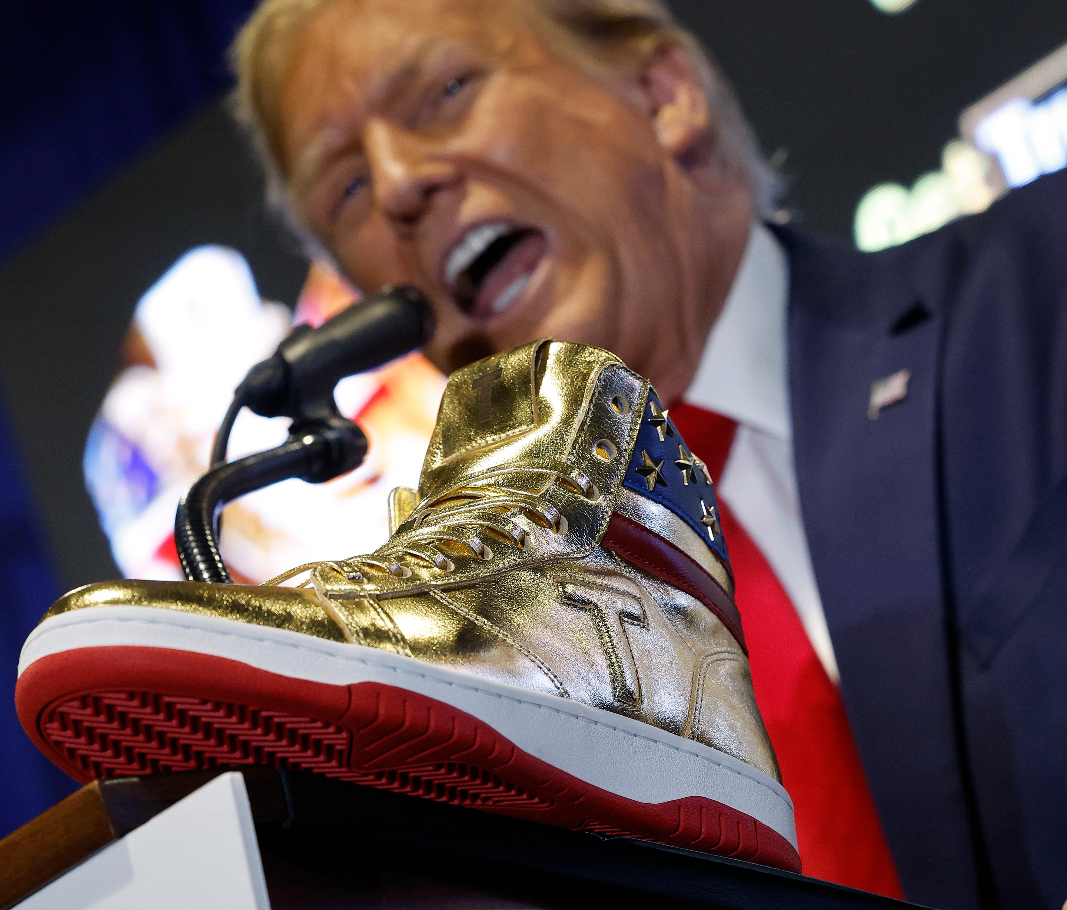 Former President Donald Trump introduces his signature shoes at 