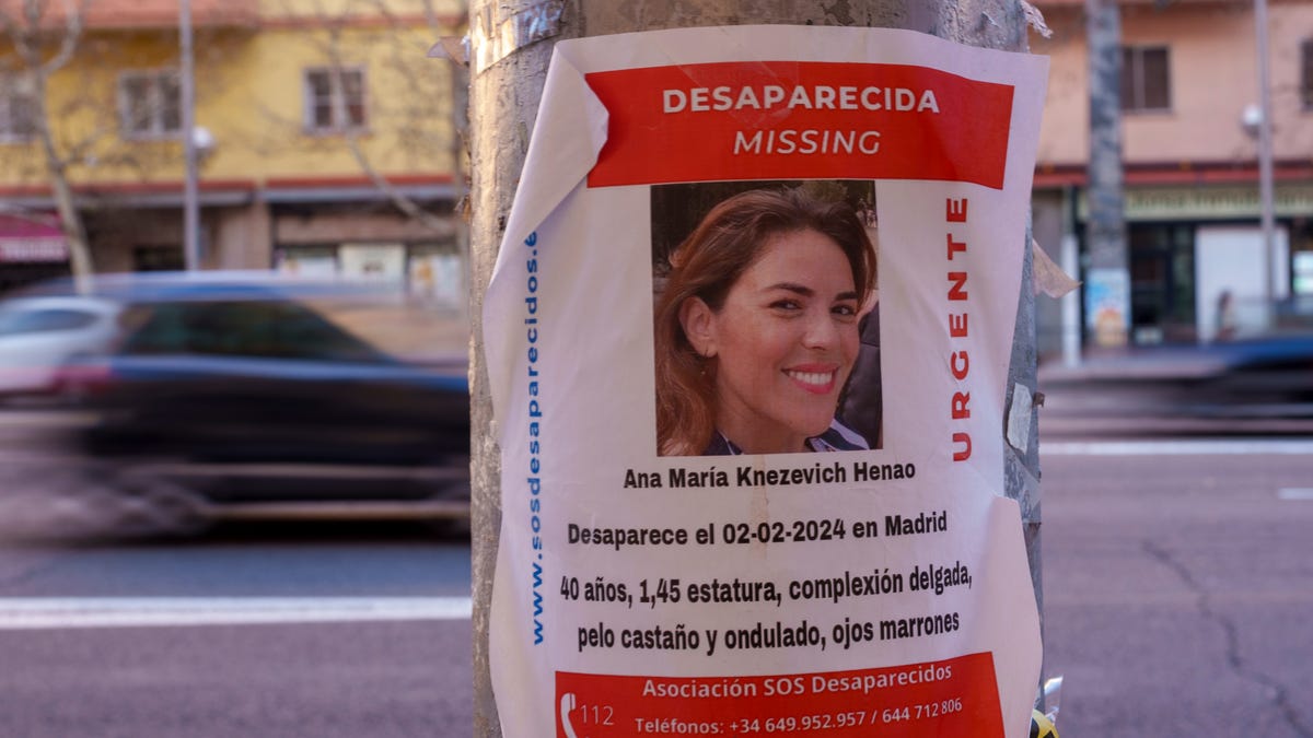 A banner of missing woman Ana Maria Knezevic, 40, is displayed on a streetlight in Madrid, Spain, Friday, Feb. 16, 2024. Spanish police are looking for the Colombian-born American woman who has been reported missing in Madrid since early February. A police spokeswoman said a friend filed a missing persons complaint in a Madrid city center station on Feb. 4.
