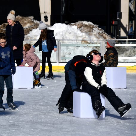 Families take to the Worcester Common Oval for a day of ice skating in a file photo.