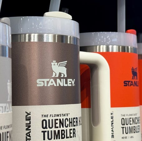 Stanley tumblers displayed on a shelf at a Dick's Sporting Goods store on Feb. 2, 2024 in Daly City, California. The wildly popular Stanley mugs are going viral again, this time many of the users are claiming that the products contain lead.