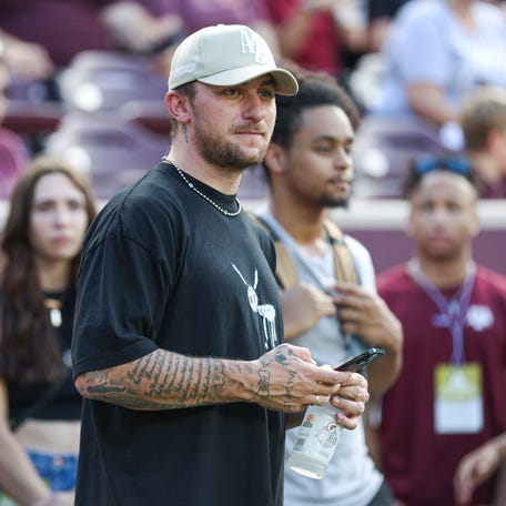 Sep 16, 2023; College Station, Texas, USA; Former Texas A&M Aggies player Johnny Manziel watches from the sideline during the first half of the game between the Aggies and the Louisiana Monroe Warhawks at Kyle Field. Mandatory Credit: Troy Taormina-USA TODAY Sports